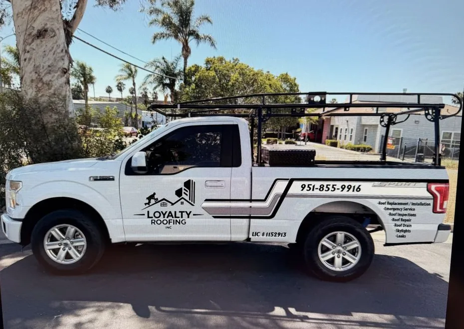 Loyalty Roofing work truck with ladder rack in Norco